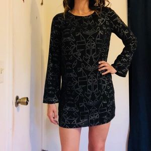 Short black dress with silver design